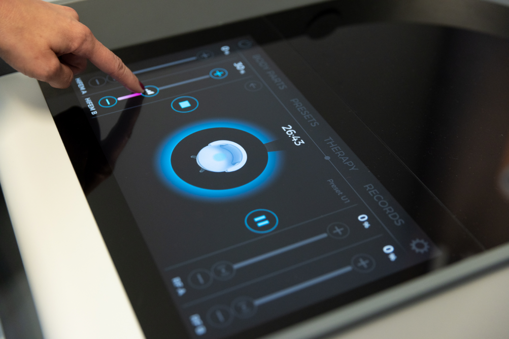 A close-up of the touchscreen controls for Emsella pelvic floor therapy in Thunder Bay, ON.