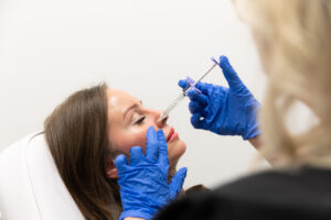 A provider makes an injection during a treatment for medi aesthetics in Thunder Bay, ON